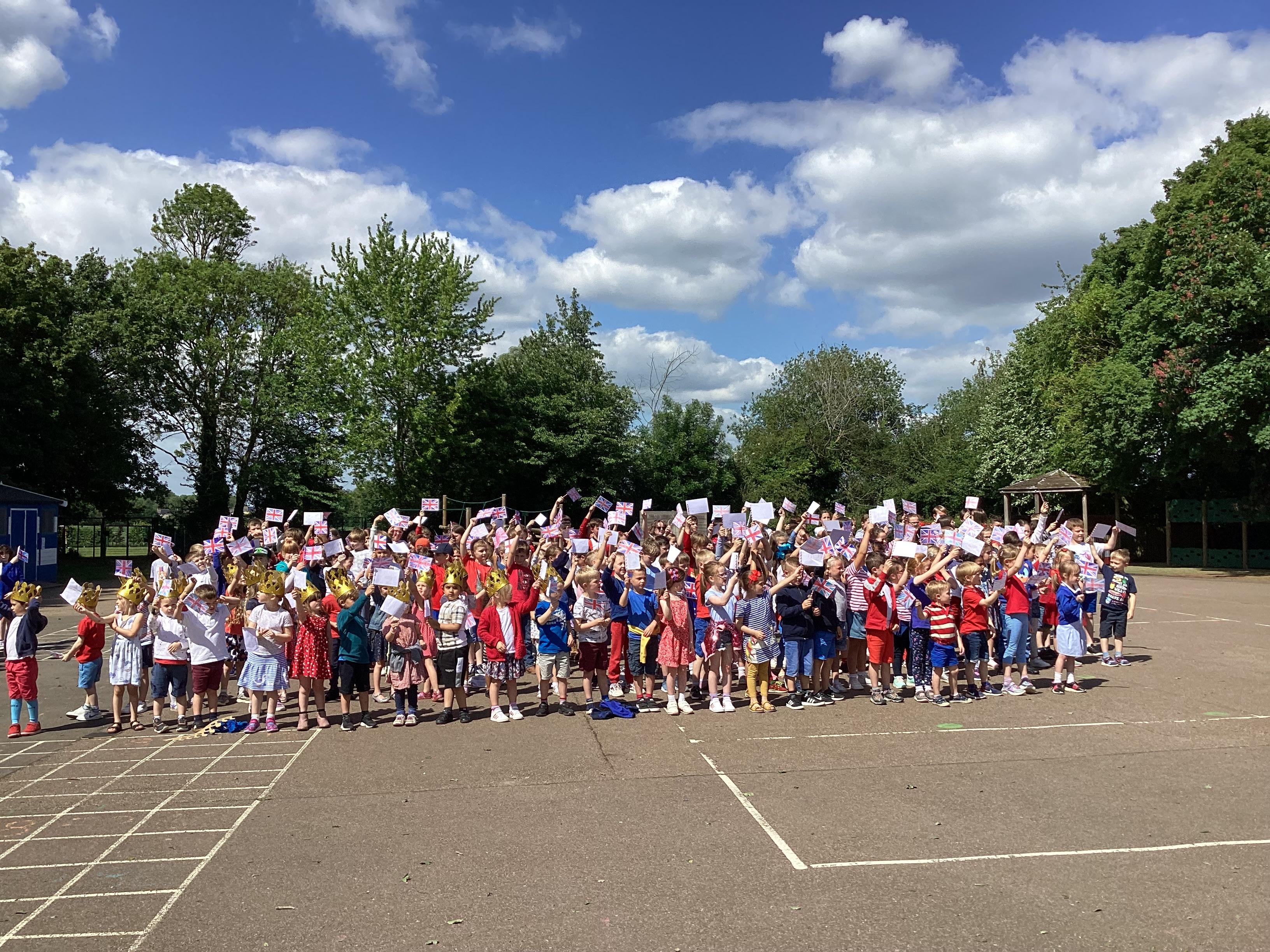 THe children gathered to give thanks for the Queen's reign,